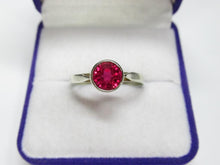Load image into Gallery viewer, Close-up of Vivid Pink-Magenta Round Faceted Tourmaline on Vintage 875 Silver Bezel Ring