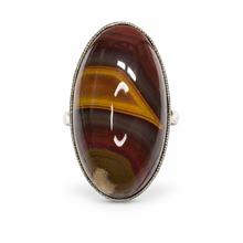 Load image into Gallery viewer, Vintage USSR 925 sterling silver ring featuring a large elongated oval banded agate cabochon with reddish-brown, amber-yellow, and dark brown layers, size 7.25.