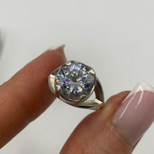 Load image into Gallery viewer, Vintage 925 Sterling Silver statement ring with cubic zirconia, women's size 6, featuring intricate design and sparkling stones.