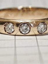 Load image into Gallery viewer, Side View of Vintage 14K Gold Three-Diamond Band Ring