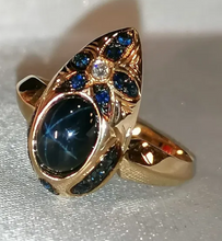 Load image into Gallery viewer, Close-up of Natural Blue Star Sapphire with Six-Ray Asterism on 14K Gold Ring