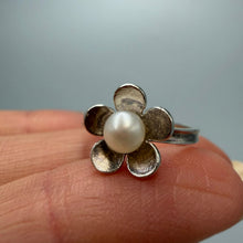 Load image into Gallery viewer, Vintage sterling silver flower ring with pearl accents, size 6, by Fezba Market, showcasing intricate floral design and shiny silver finish.