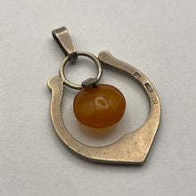 Load image into Gallery viewer, Vintage USSR 875 silver Baltic amber pendant featuring Art Nouveau design, showcasing intricate craftsmanship and warm amber hues.