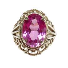 Load image into Gallery viewer, Vintage 875 silver gilt ring with an oval pink amethyst, ornate filigree border and split shoulders on white.