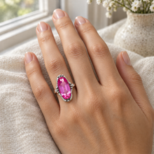Load image into Gallery viewer, Vintage 875 silver pink amethyst ring worn on a finger, showing the elongated oval gemstone and silver bead accents.