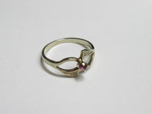Load image into Gallery viewer, Vintage 875 silver gilt amethyst ring on a white surface, showing the round band and openwork setting.