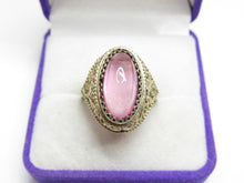 Load image into Gallery viewer, Front view of a vintage 875 silver gilt amethyst cabochon ring in a purple and white jewelry box.