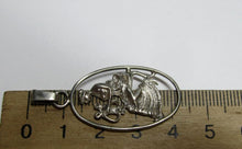 Load image into Gallery viewer, Vintage Russian Soviet pendant in sterling silver 875, women's jewelry featuring a detailed design, weighs 3.23 grams.