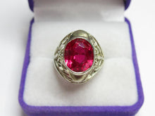 Load image into Gallery viewer, Close-up of Large Faceted Oval Ruby on Vintage USSR 875 Silver Filigree Ring
