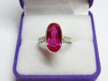 Load image into Gallery viewer, Close-up of Large Faceted Elongated Oval Ruby on Vintage USSR 875 Silver Ring
