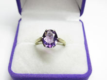 Load image into Gallery viewer, Close-up of Vivid Purple Oval Faceted Amethyst on Vintage 875 Silver Gilded Ring
