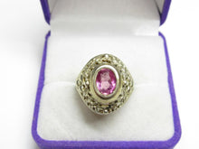 Load image into Gallery viewer, Front view of a vintage 875 silver gilt amethyst ring with ornate filigree and bead accents in a purple jewelry box.
