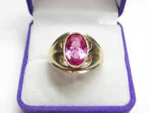 Load image into Gallery viewer, Front view of a vintage 875 silver gilt oval amethyst ring with symmetrical curved cutouts in a purple jewelry box.

