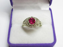 Load image into Gallery viewer, Close-up of Round Faceted Ruby on Vintage USSR 875 Silver Filigree Ring
