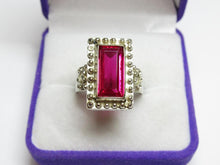 Load image into Gallery viewer, Close-up of Vivid Pink-Magenta Rectangular Faceted Tourmaline on Vintage 875 Silver Ring
