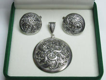 Load image into Gallery viewer, Close-up of Intricate Floral Filigree Openwork on Vintage 925 Sterling Silver Pendant
