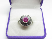 Load image into Gallery viewer, Close-up of Vivid Pink-Magenta Faceted Tourmaline on Vintage 875 Silver Ring
