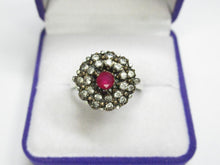 Load image into Gallery viewer, Close-up of Central Ruby and Clear Stone Cluster on Vintage Sterling Silver Ring
