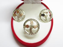 Load image into Gallery viewer, Close-up of Rose Gold Tulip Motifs on Vintage 875 Sterling Silver Circular Ring with CZ Border
