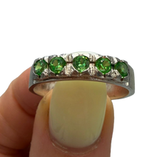 Load image into Gallery viewer, Vintage 925 sterling silver eternity ring featuring green peridot gemstones, band size 9.5, from Fezba Market.
