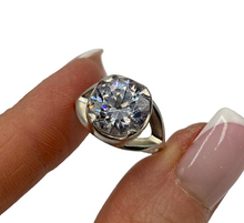 Load image into Gallery viewer, Sterling silver statement ring with cubic zirconia stones, women’s size 6, featuring intricate vintage design and shiny gemstone accents.

