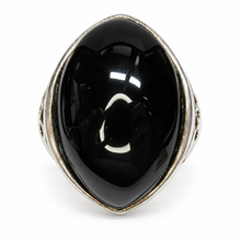 Load image into Gallery viewer, Vintage 925 sterling silver black agate statement ring featuring a large elongated oval black cabochon, polished silver bezel, and ornate detailing, US size 9.
