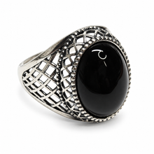 Load image into Gallery viewer, Side view of vintage sterling silver 925 black agate ring with raised oval cabochon, intricate diamond-pattern openwork, and oxidized silver detailing.
