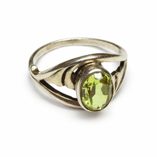 Load image into Gallery viewer, Side view of vintage Soviet 875 silver citrine ring featuring an oval bezel-set gemstone, flowing wave-shaped shoulders, and elegant openwork band.

