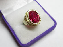 Load image into Gallery viewer, Close-up of Large Faceted Oval Ruby on Vintage Soviet Sterling Silver Gilt Ring
