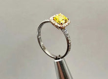 Load image into Gallery viewer, Side View of 14K White and Yellow Gold Halo Ring with Yellow Diamond and Pave Accents
