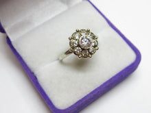 Load image into Gallery viewer, Vintage 925 sterling silver statement ring with cubic zirconia, women's size 7.75, featuring intricate design details.
