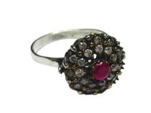 Load image into Gallery viewer, Side View of Vintage 925 Sterling Silver Cluster Ring featuring Central Ruby and Surrounding Stones
