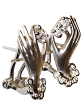 Load image into Gallery viewer, Close-up of Sculptural Hand Motif holding Marquise Diamond on 18K White Gold Earrings
