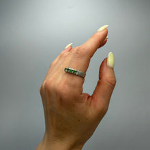 Load image into Gallery viewer, Vintage 925 sterling silver eternity ring with green peridot gemstones, size 9.5, featuring a continuous band design.
