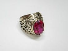 Load image into Gallery viewer, Close-up of Large Oval Faceted Ruby on Vintage Soviet Sterling Silver Filigree Ring
