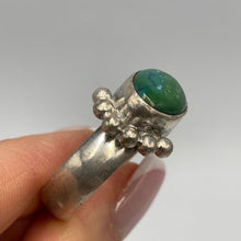 Load image into Gallery viewer, Antique Russian 84 silver ring featuring a natural turquoise cabochon in size 13.5, with intricate silver detailing and a bold statement style.

