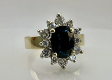 Load image into Gallery viewer, Close-up of Deep Blue Oval Sapphire with Diamond Halo on Vintage USSR 583 Gold Ring
