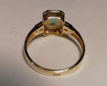 Load image into Gallery viewer, Profile View of 14K Yellow Gold Rectangular Halo Ring with Natural Emerald and Diamonds
