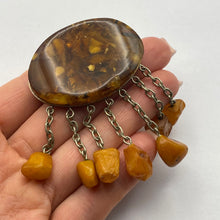 Load image into Gallery viewer, Close-up of Vintage USSR Baltic Amber Brooch with Dangle Chains
