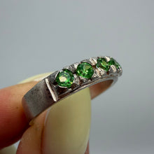 Load image into Gallery viewer, Vintage 925 sterling silver eternity ring with green peridot gemstones, size 9.5, featuring a continuous band design.
