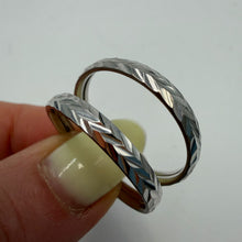 Load image into Gallery viewer, Close-up of Vintage 925 Sterling Silver Textured Hoop Earrings with Chevron Pattern
