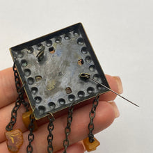 Load image into Gallery viewer, Vintage USSR Baltic Amber dangle brooch with brutalist silver design, featuring natural amber stones and a bold statement style.
