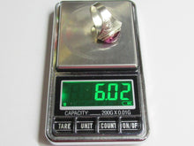 Load image into Gallery viewer, Vintage 875 silver amethyst cabochon statement ring on a digital scale displaying a weight of 6.02 grams.
