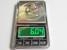 Load image into Gallery viewer, Vintage 875 silver gilt amethyst filigree ring on a digital scale displaying a weight of 6.04 grams.
