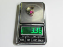Load image into Gallery viewer, Vintage 875 silver gilt emerald-cut amethyst ring on a digital scale displaying a weight of 3.36 grams.
