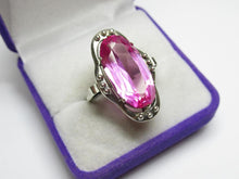 Load image into Gallery viewer, Angled view of an 875 silver amethyst ring showing the faceted oval stone, bead clusters and slim band.
