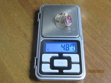 Load image into Gallery viewer, Vintage 875 silver gilt amethyst cabochon filigree ring on a digital scale displaying a weight of 4.87 grams.

