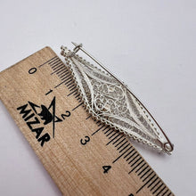 Load image into Gallery viewer, Vintage USSR filigree silver brooch handmade with 800 and 960 silver, featuring intricate metalwork and a classic pin design.
