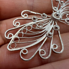 Load image into Gallery viewer, Vintage silver filigree butterfly brooch with handmade wirework jewelry design, featuring intricate details and delicate craftsmanship.
