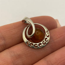 Load image into Gallery viewer, Vintage 925 sterling silver amber swirl pendant with modern statement design, showcasing intricate craftsmanship and warm amber tones.

